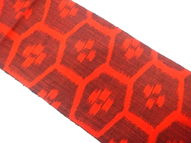 手織り真綿紬　亀甲に絣柄織り出し　名古屋帯